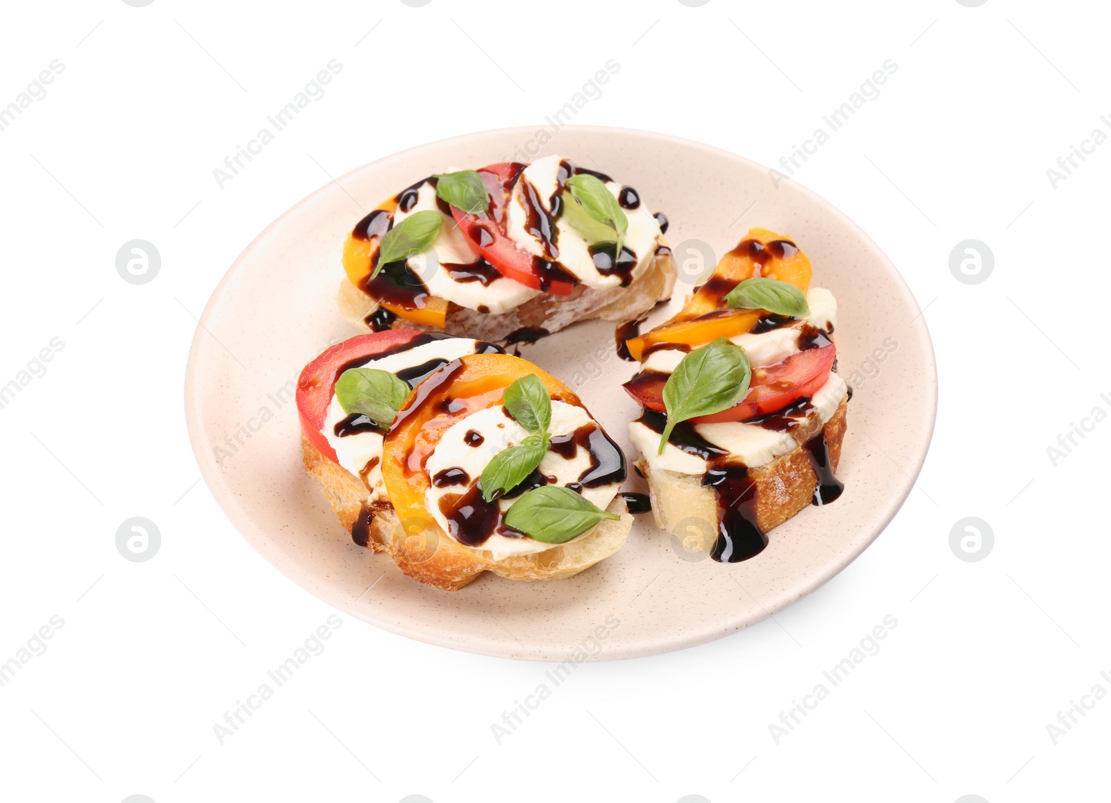 Photo of Delicious bruschettas with mozzarella cheese, tomatoes and balsamic vinegar isolated on white