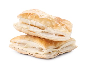 Photo of Delicious fresh puff pastries isolated on white