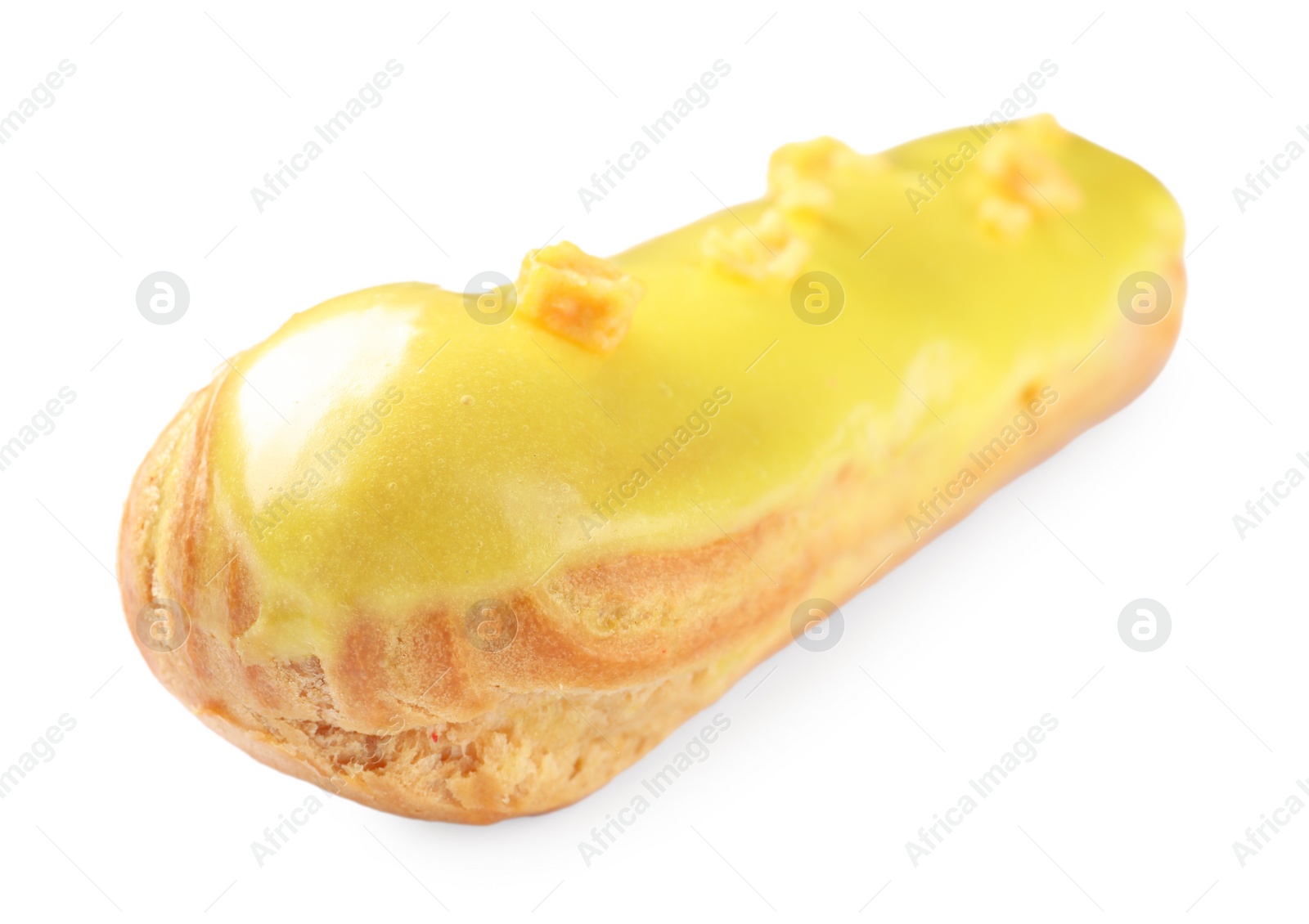 Photo of Delicious eclair covered with yellow glaze isolated on white, closeup