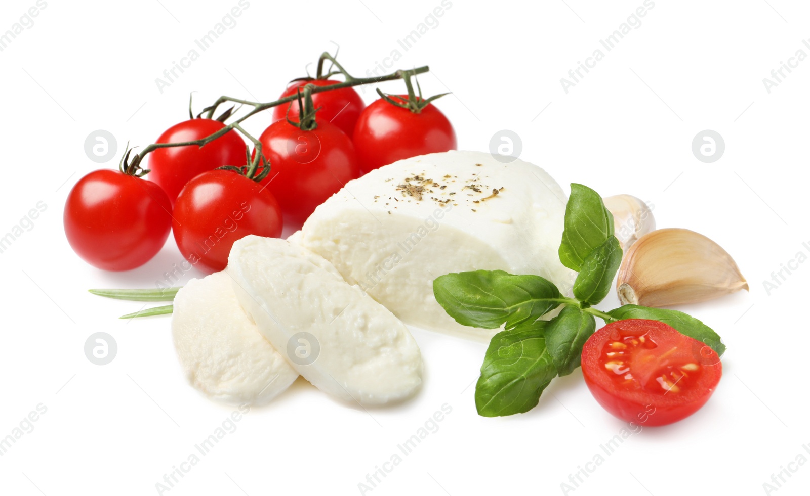 Photo of Delicious mozzarella with tomatoes and basil leaves on white background