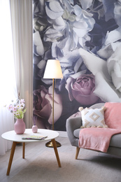 Photo of Beautiful floral photoart work used as wallpaper in living room interior
