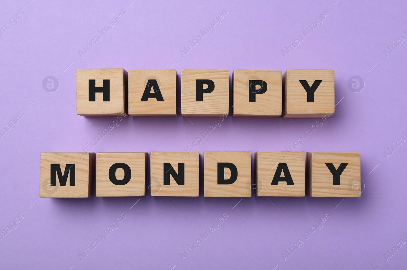 Photo of Wooden cubes with message Happy Monday on lilac background, flat lay