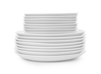 Stack of clean plates on white background. Washing dishes