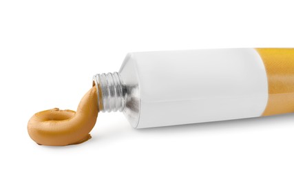 Photo of Tube with oil paint on white background