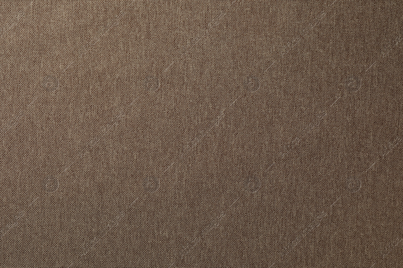 Photo of Texture of brown fabric as background, top view