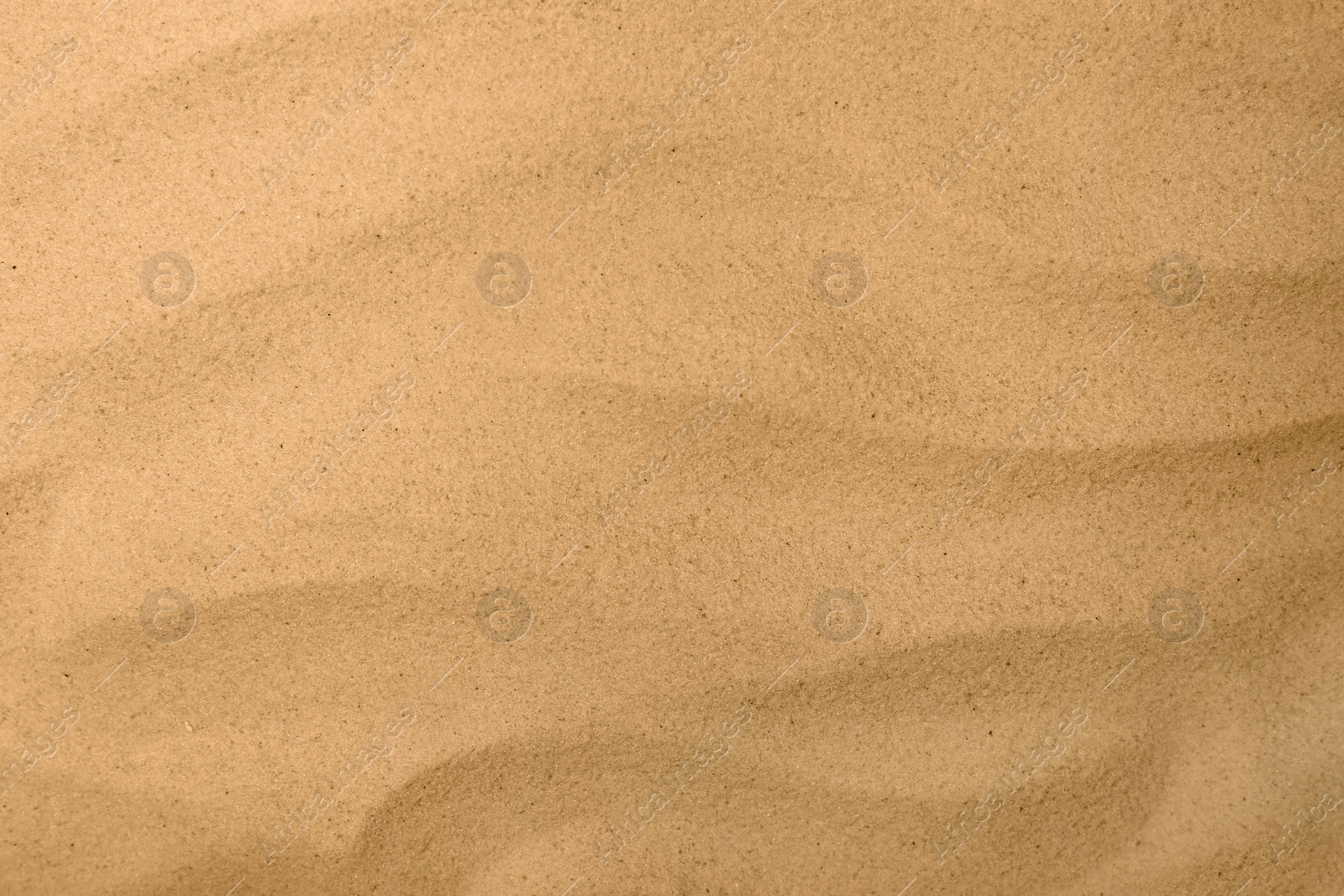 Photo of Dry beach sand as background, top view