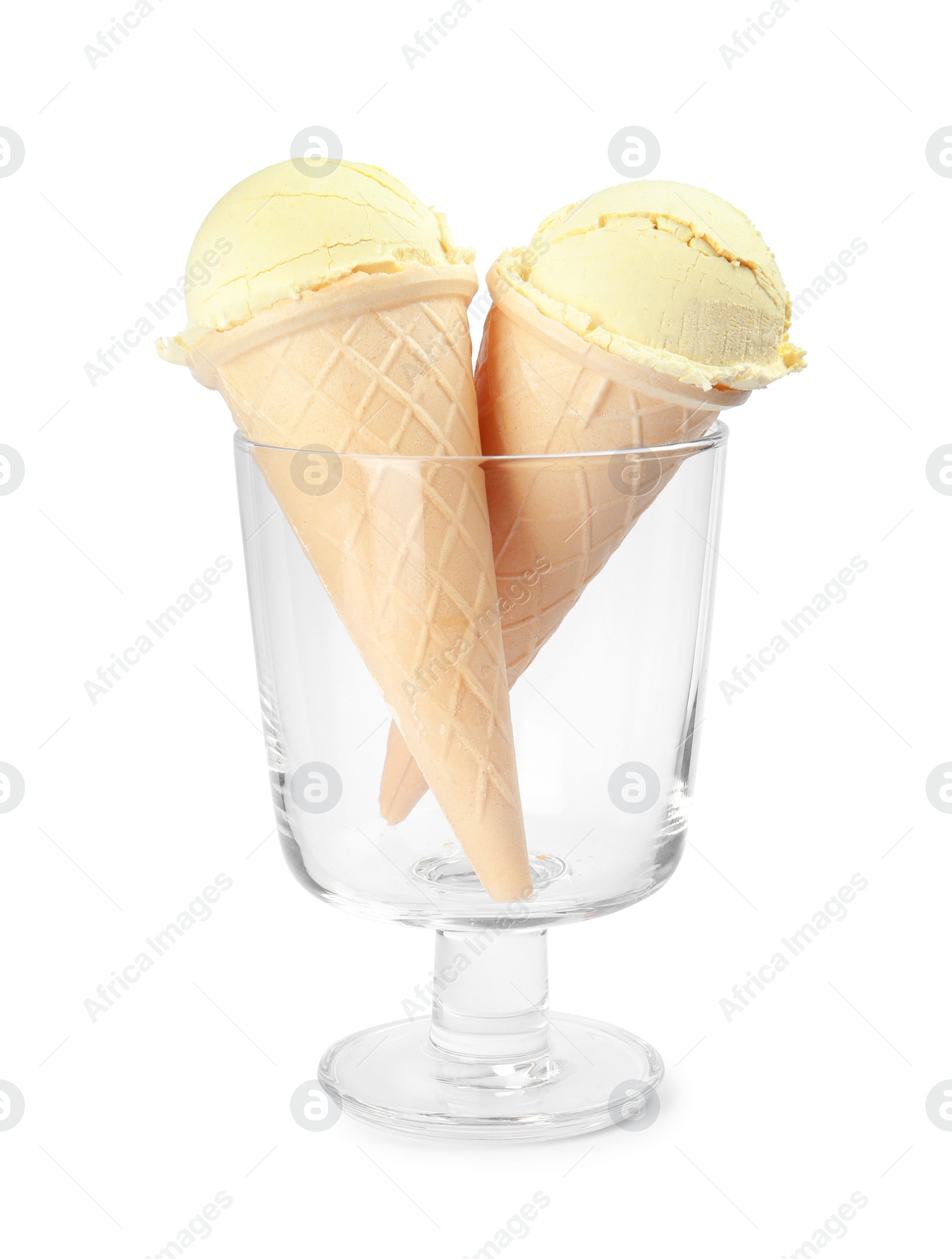 Photo of Dessert bowl with delicious vanilla ice cream in waffle cones on white background