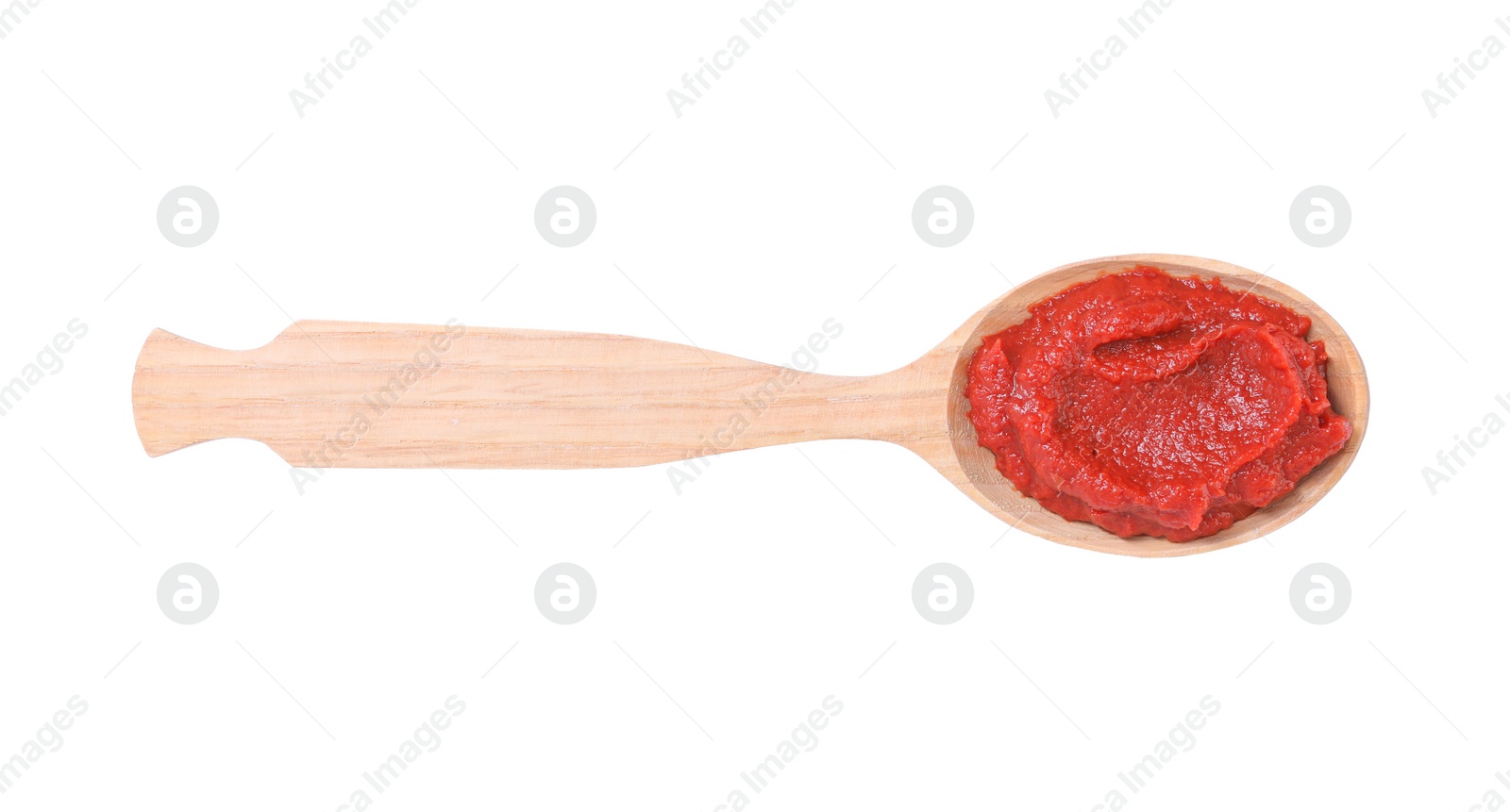 Photo of Wooden spoon of tasty tomato paste isolated on white, top view