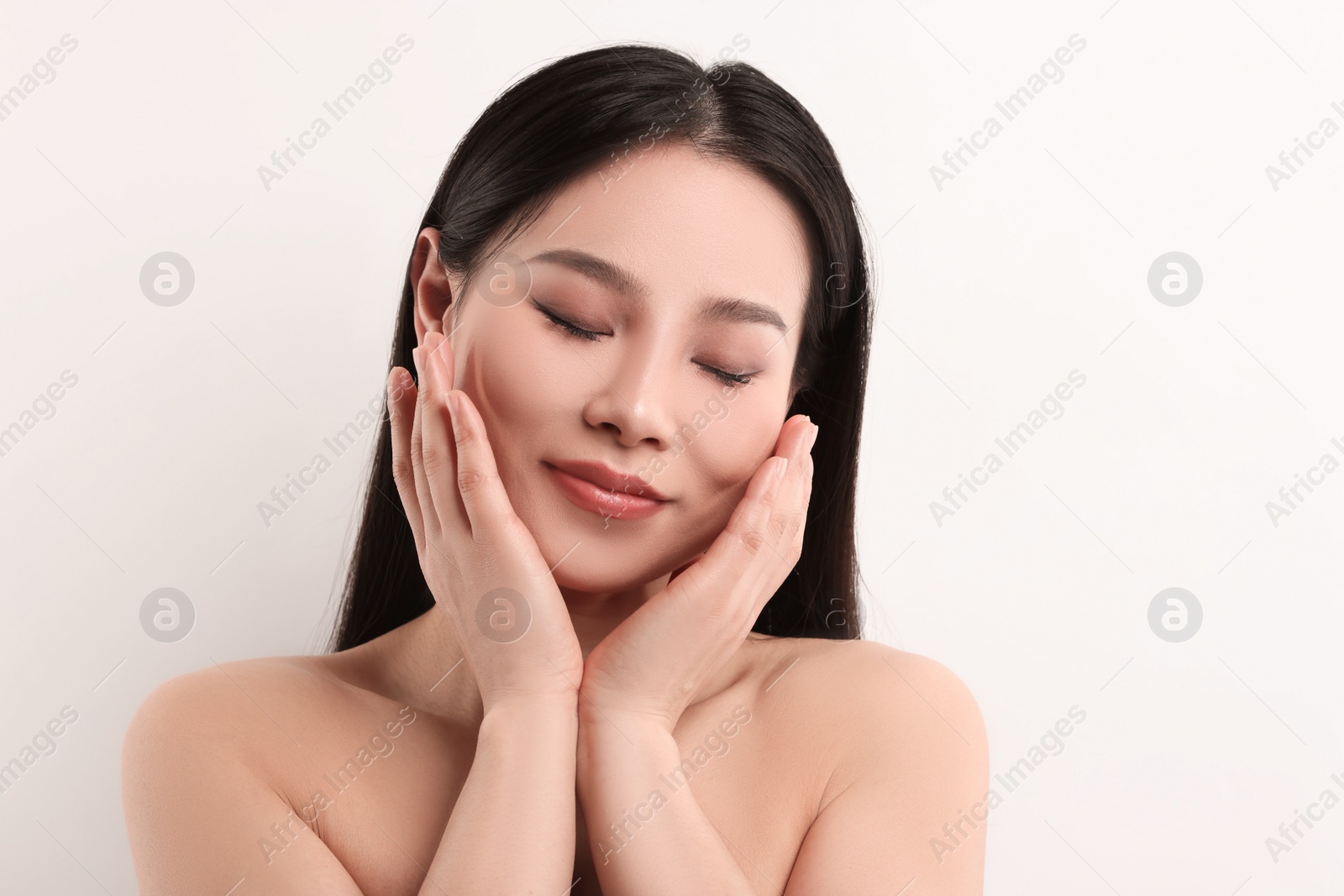 Photo of Portrait of beautiful woman on white background