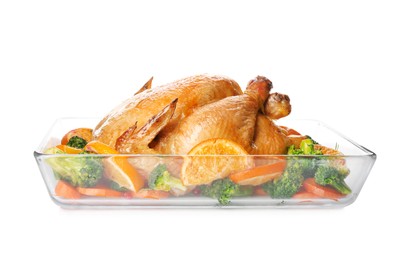 Photo of Roasted chicken with oranges and vegetables isolated on white