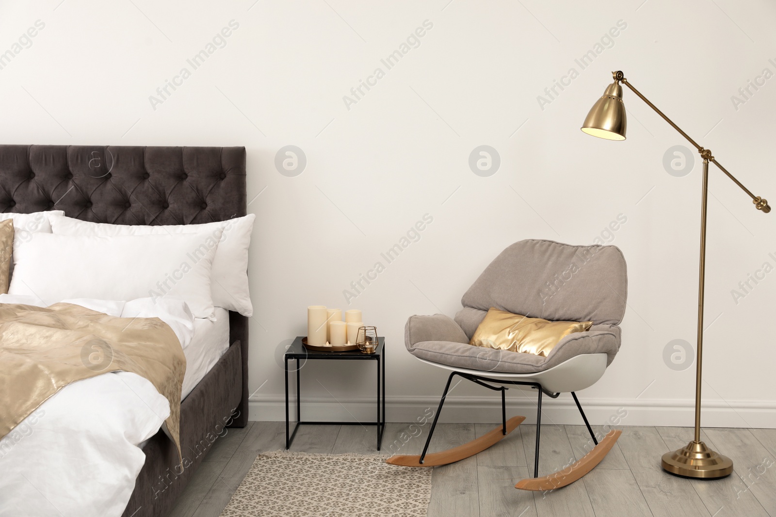 Photo of Stylish room interior with comfortable bed