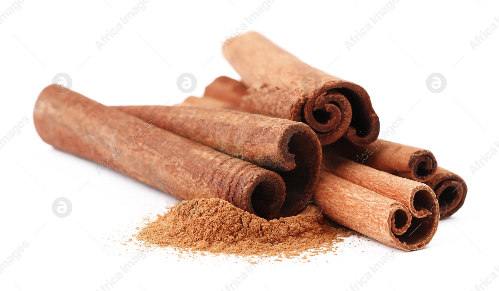 Photo of Dry aromatic cinnamon sticks and powder isolated on white