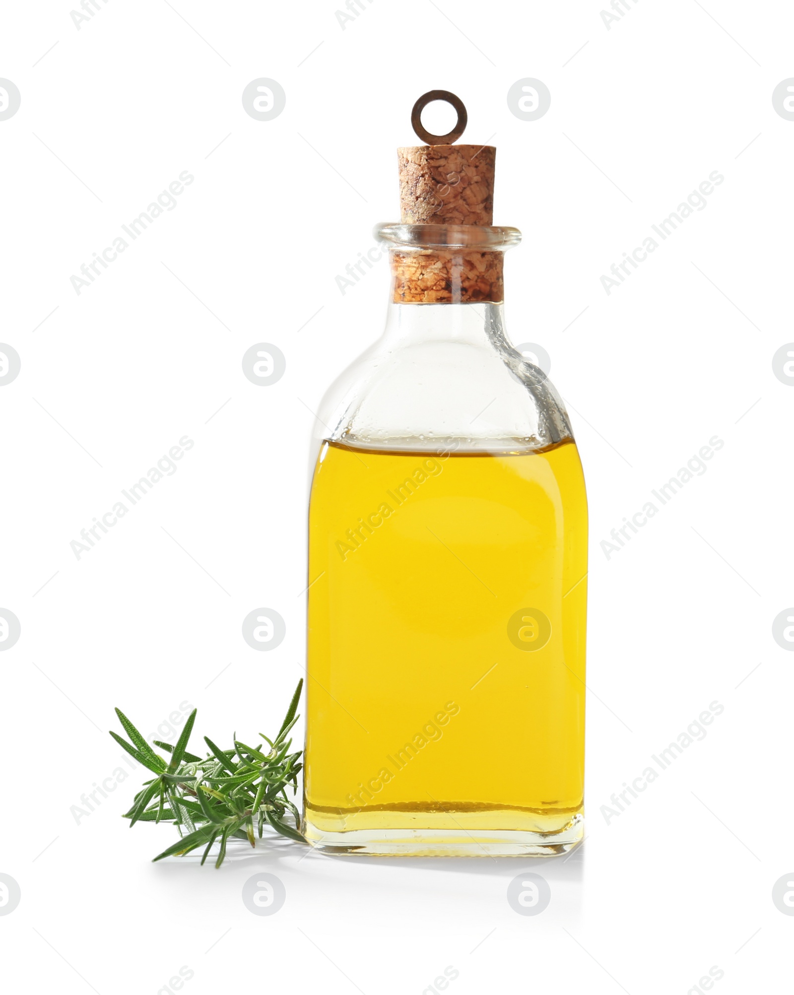 Photo of Bottle with rosemary oil on white background