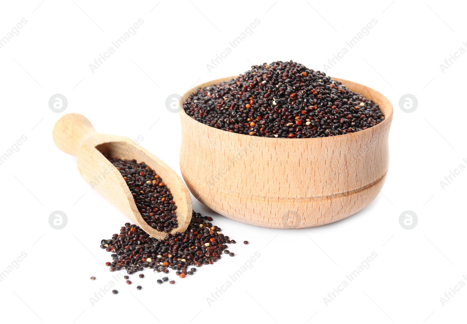 Photo of Bowl and scoop with black quinoa on white background