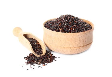 Photo of Bowl and scoop with black quinoa on white background