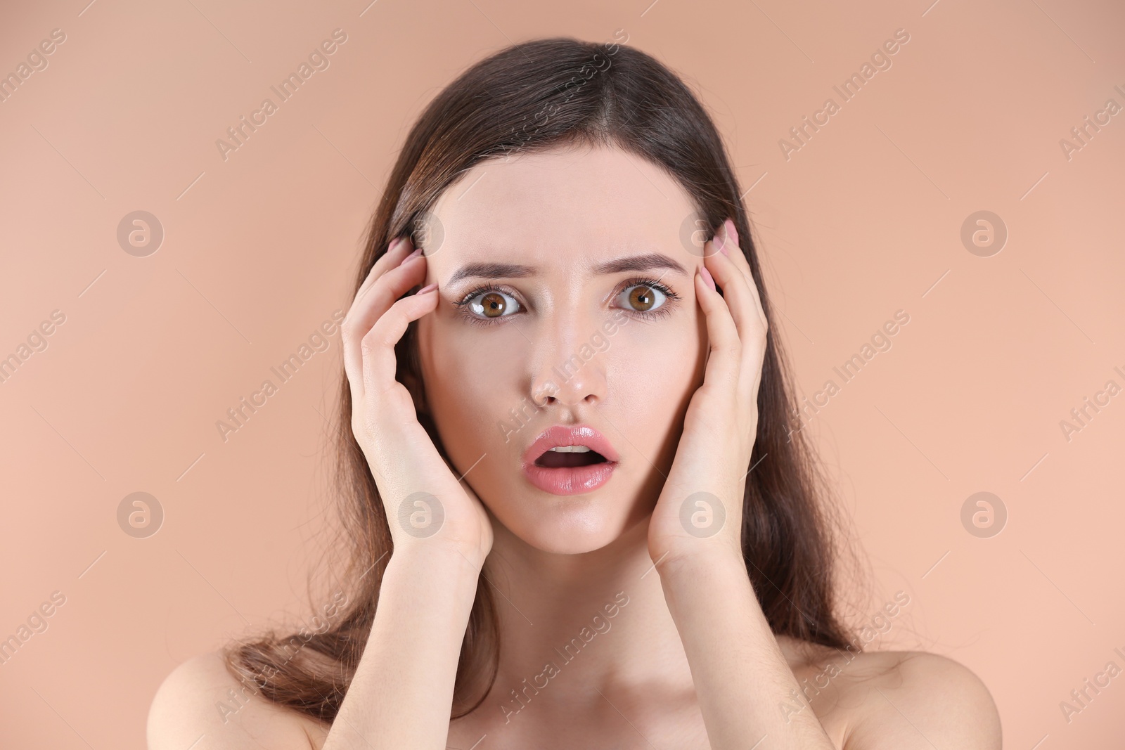 Photo of Teenage girl with acne problem against color background