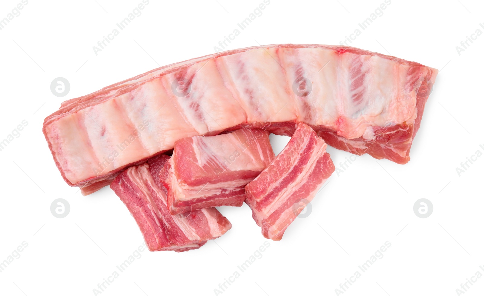 Photo of Raw pork ribs isolated on white, top view