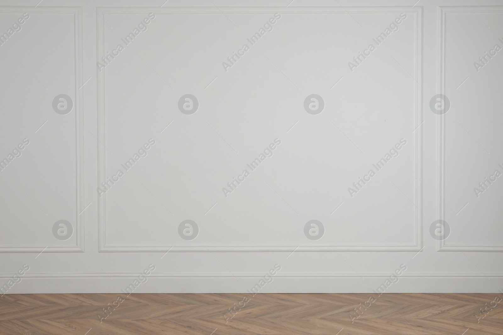 Photo of Blank white wall in room. Space for design