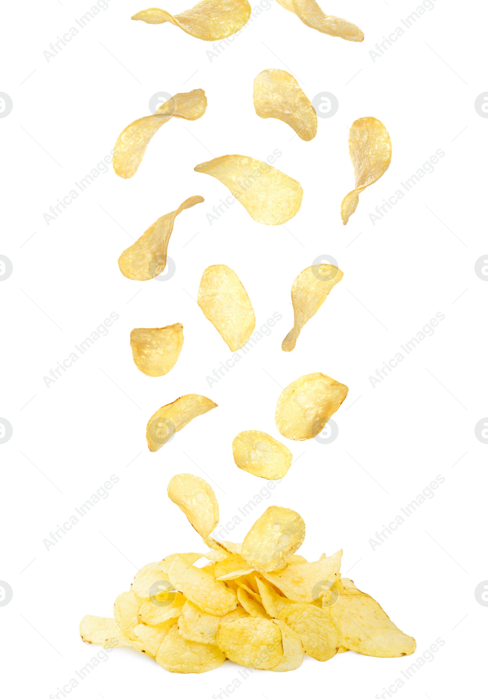 Image of Fried crispy potato chips falling into heap on white background