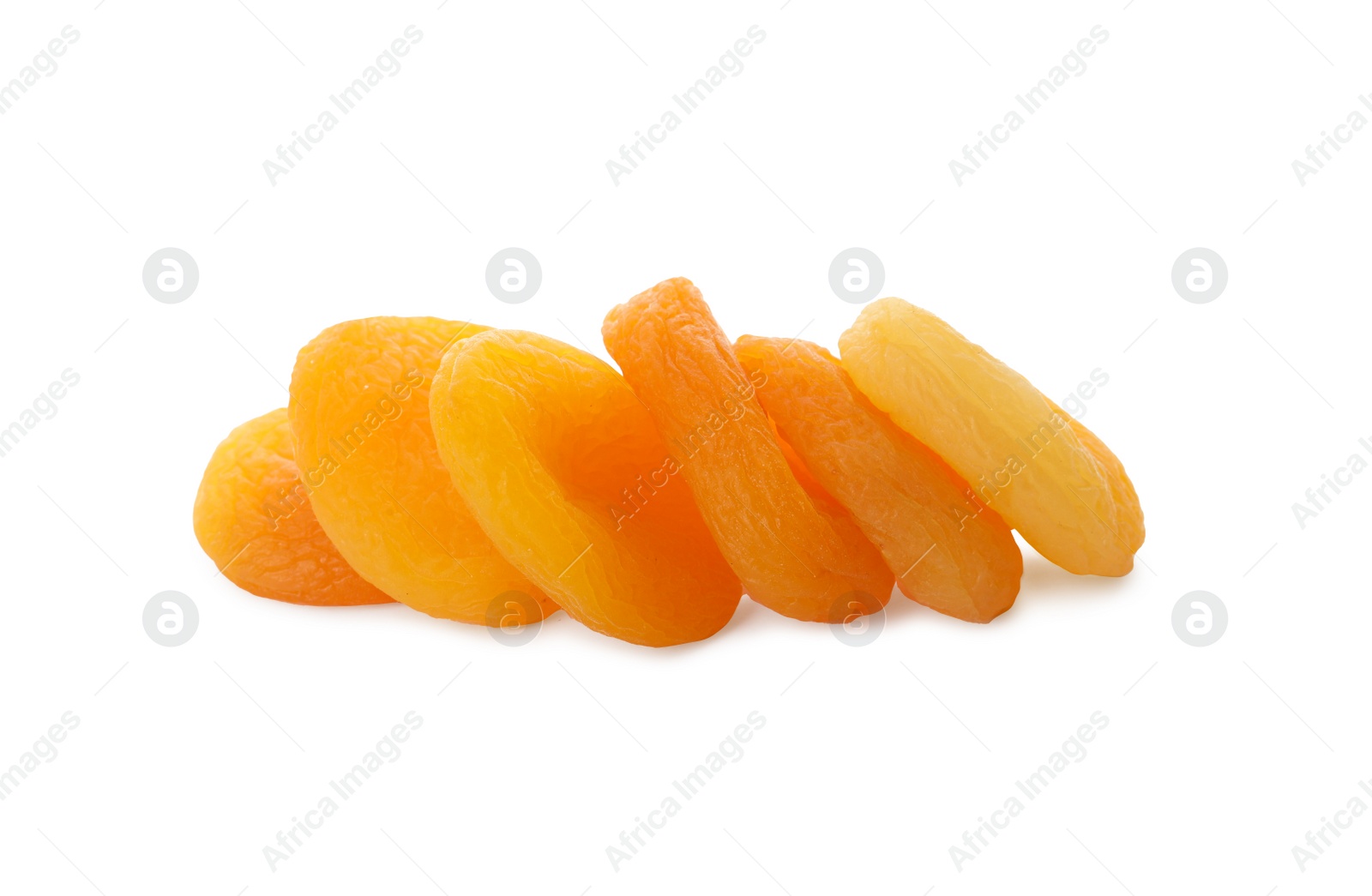 Photo of Pile of tasty apricots on white background. Dried fruits