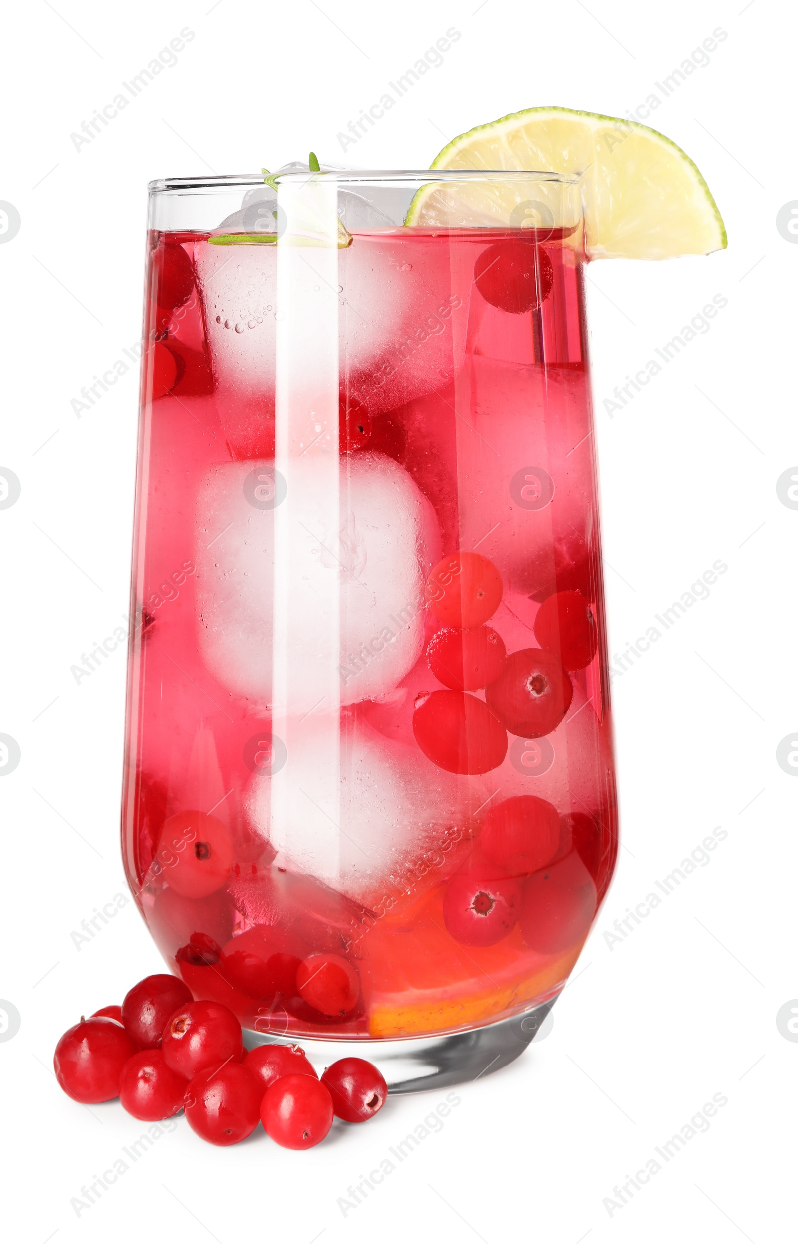 Photo of Tasty cranberry cocktail with ice cubes and lime in glass isolated on white