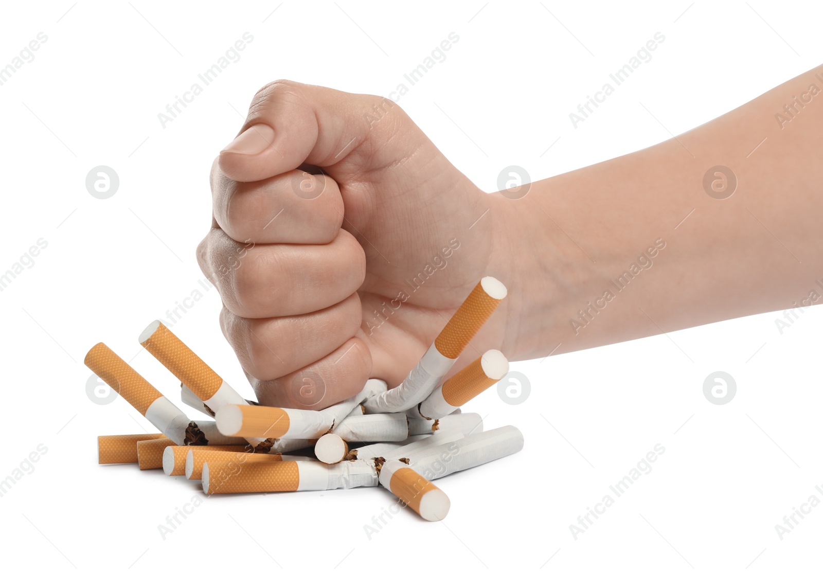 Photo of Stop smoking. Man crushing cigarettes on white background, closeup