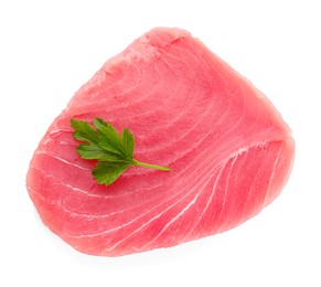 Raw tuna fillet and parsley leaf isolated on white, top view