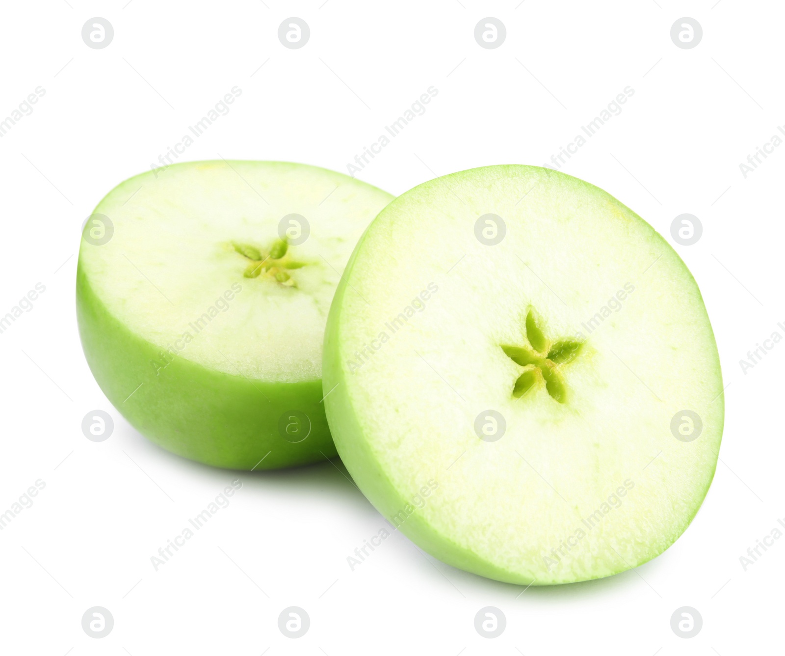 Photo of Halves of fresh green apple on white background