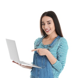 Photo of Portrait of young woman in casual outfit with laptop on white background