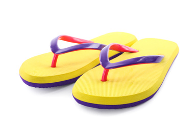 Photo of Pair of stylish yellow flip flops isolated on white. Beach object