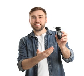 Happy man with breathalyzer on white background