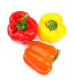 Photo of Fresh ripe bell peppers on white background, top view
