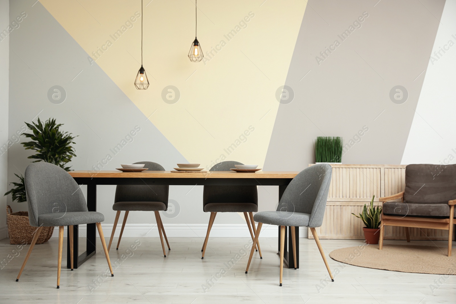 Photo of Modern wooden dining table in room interior