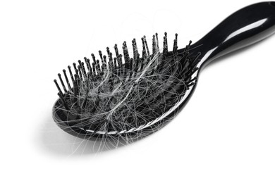 Photo of Brush with lost hair isolated on white