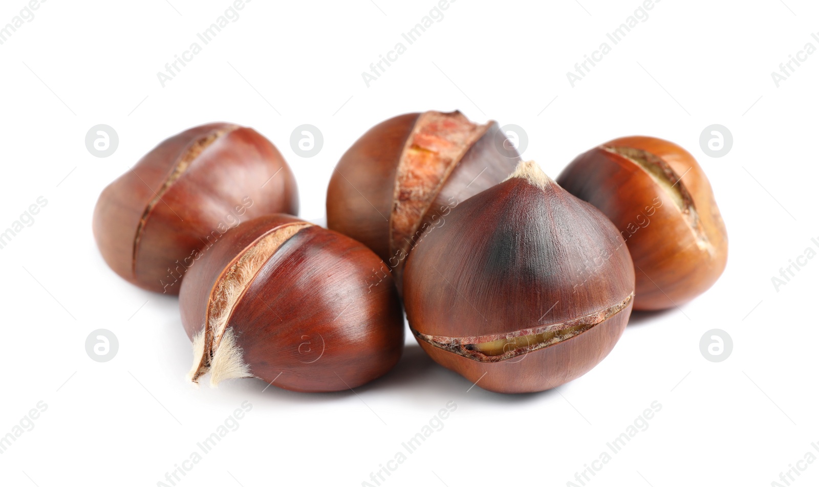 Photo of Delicious sweet roasted edible chestnuts isolated on white