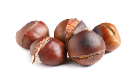 Photo of Delicious sweet roasted edible chestnuts isolated on white