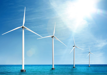 Floating wind turbines installed in sea. Alternative energy source 