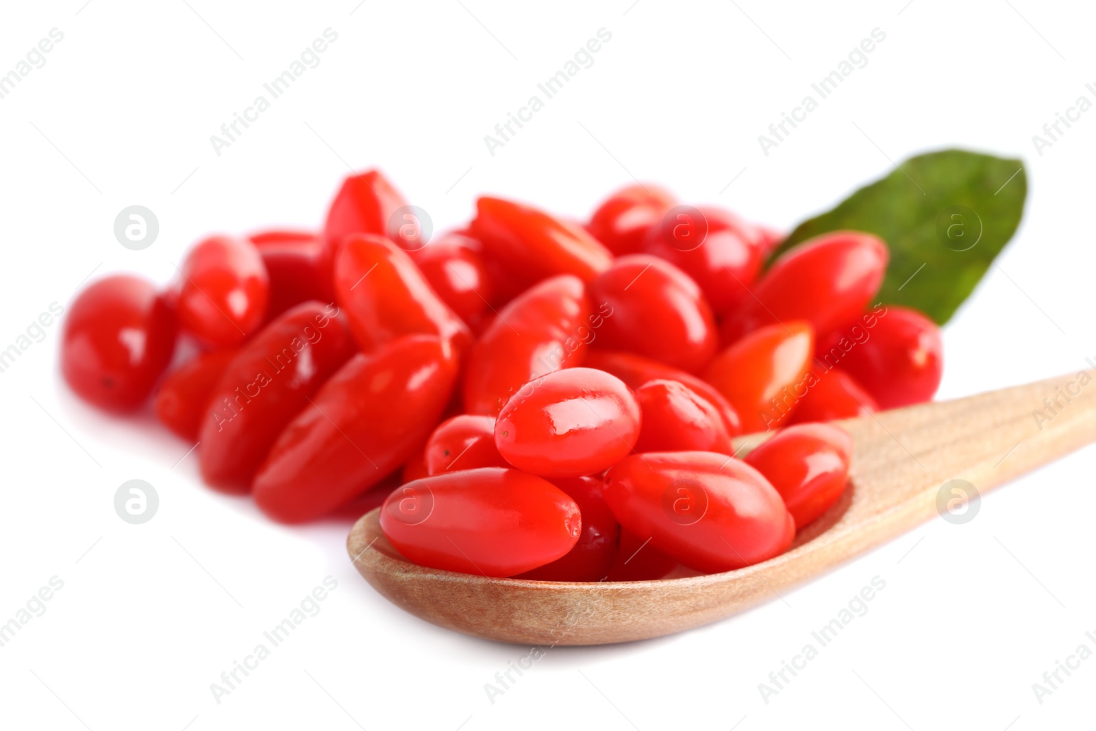 Photo of Fresh ripe goji berries and wooden spoon on white background