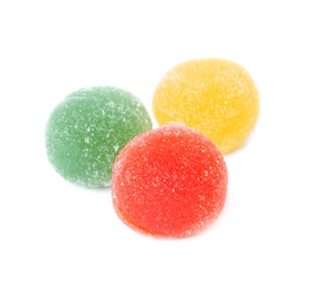 Delicious colorful chewing candies on white background