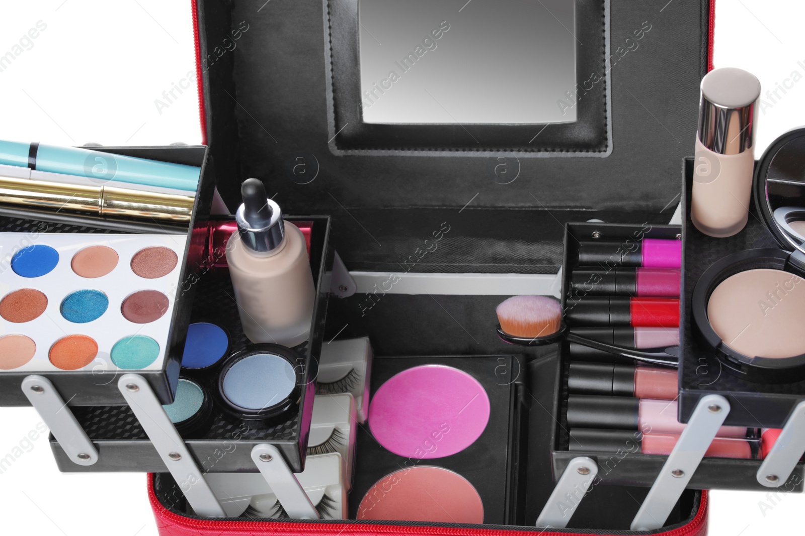 Photo of Stylish case with makeup products and beauty accessories on white background, closeup