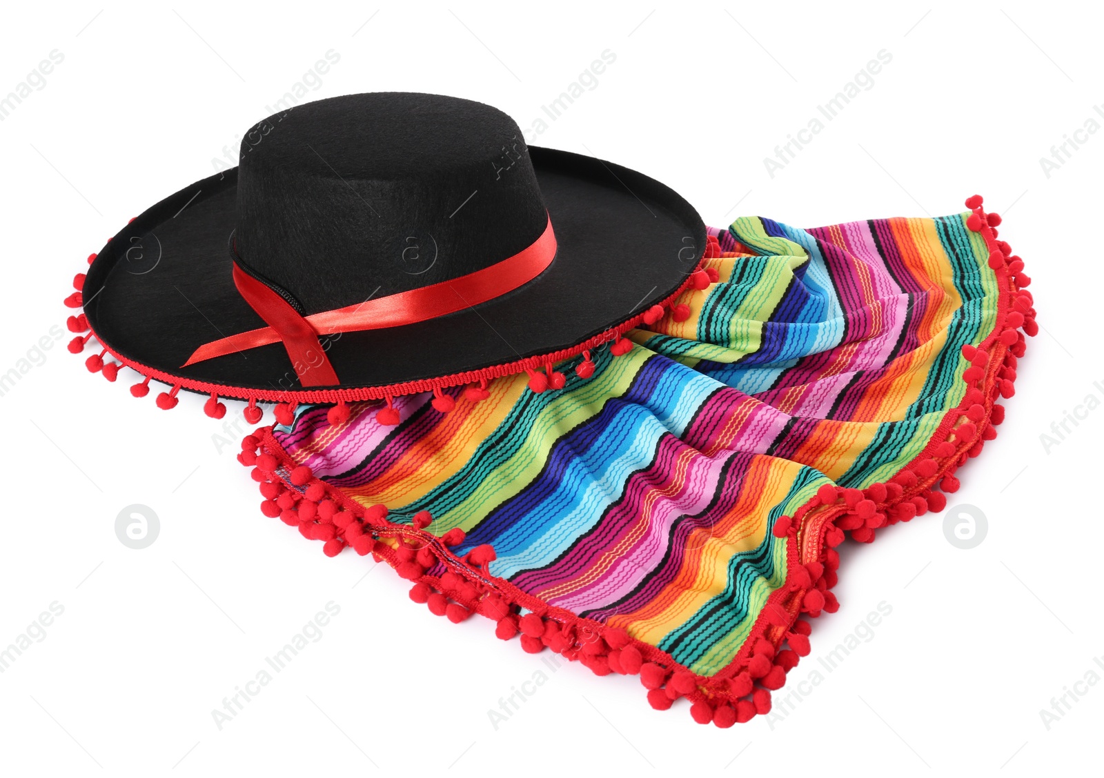 Photo of Mexican sombrero hat and colorful poncho isolated on white