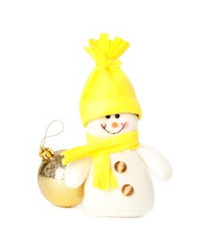 Photo of Cute snowman toy and golden Christmas ball isolated on white