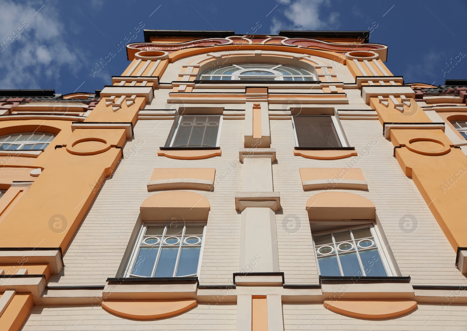 Photo of Wall of vintage building with beautiful windows