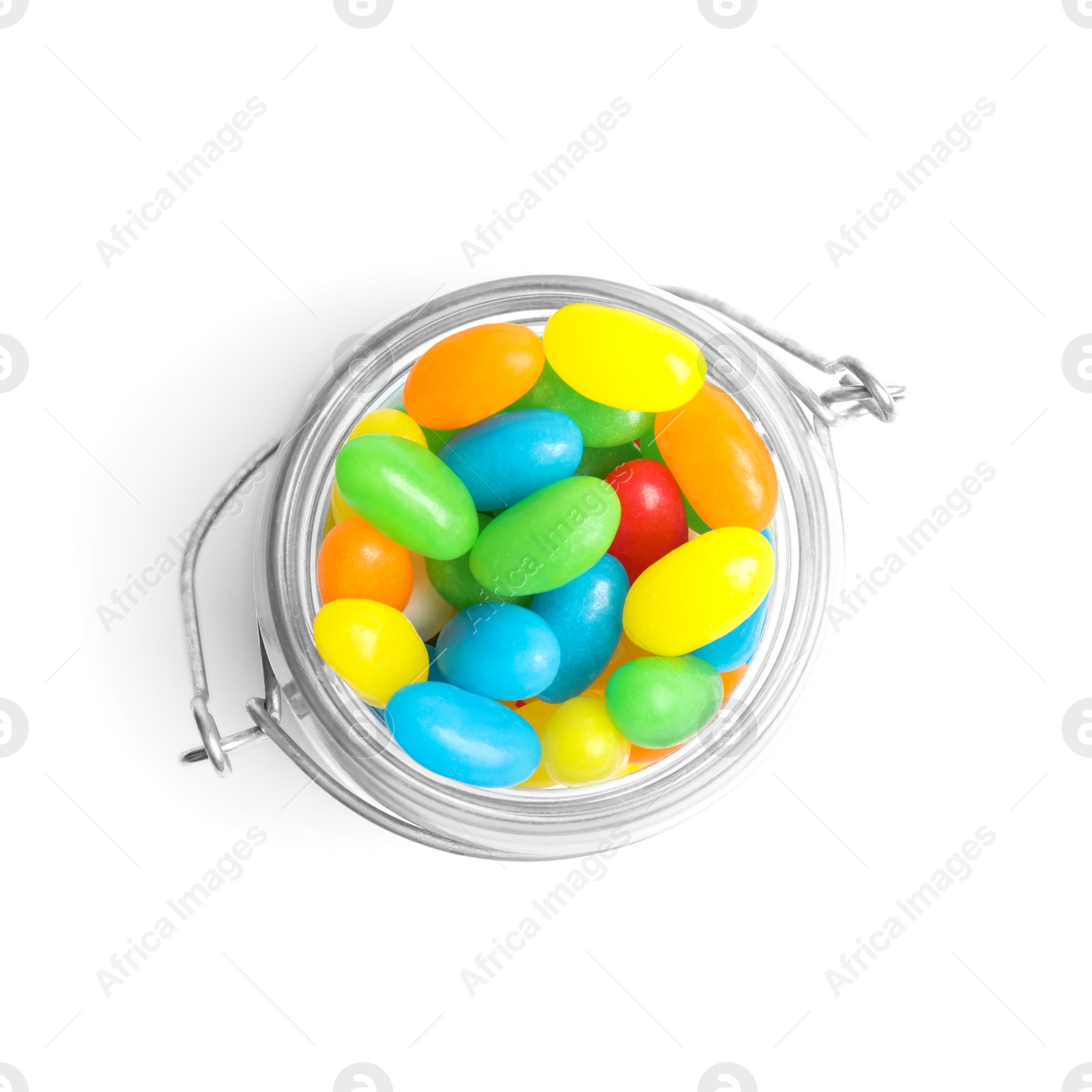 Photo of Jar of delicious color jelly beans isolated on white, top view
