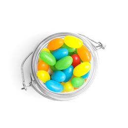 Jar of delicious color jelly beans isolated on white, top view
