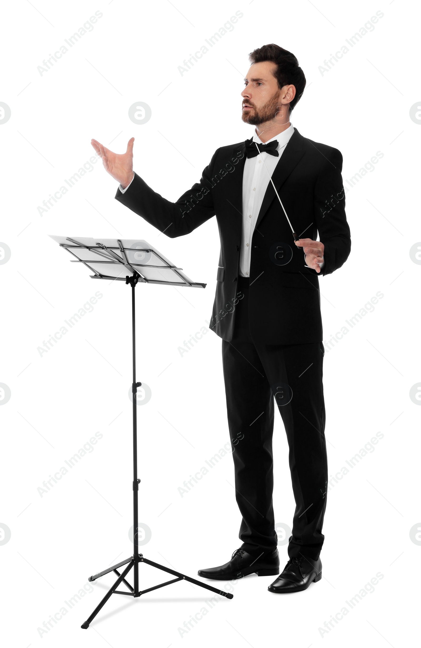 Photo of Professional conductor with baton and note stand on white background