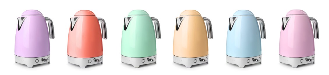 Image of Set with stylish electrical kettles on white background. Banner design