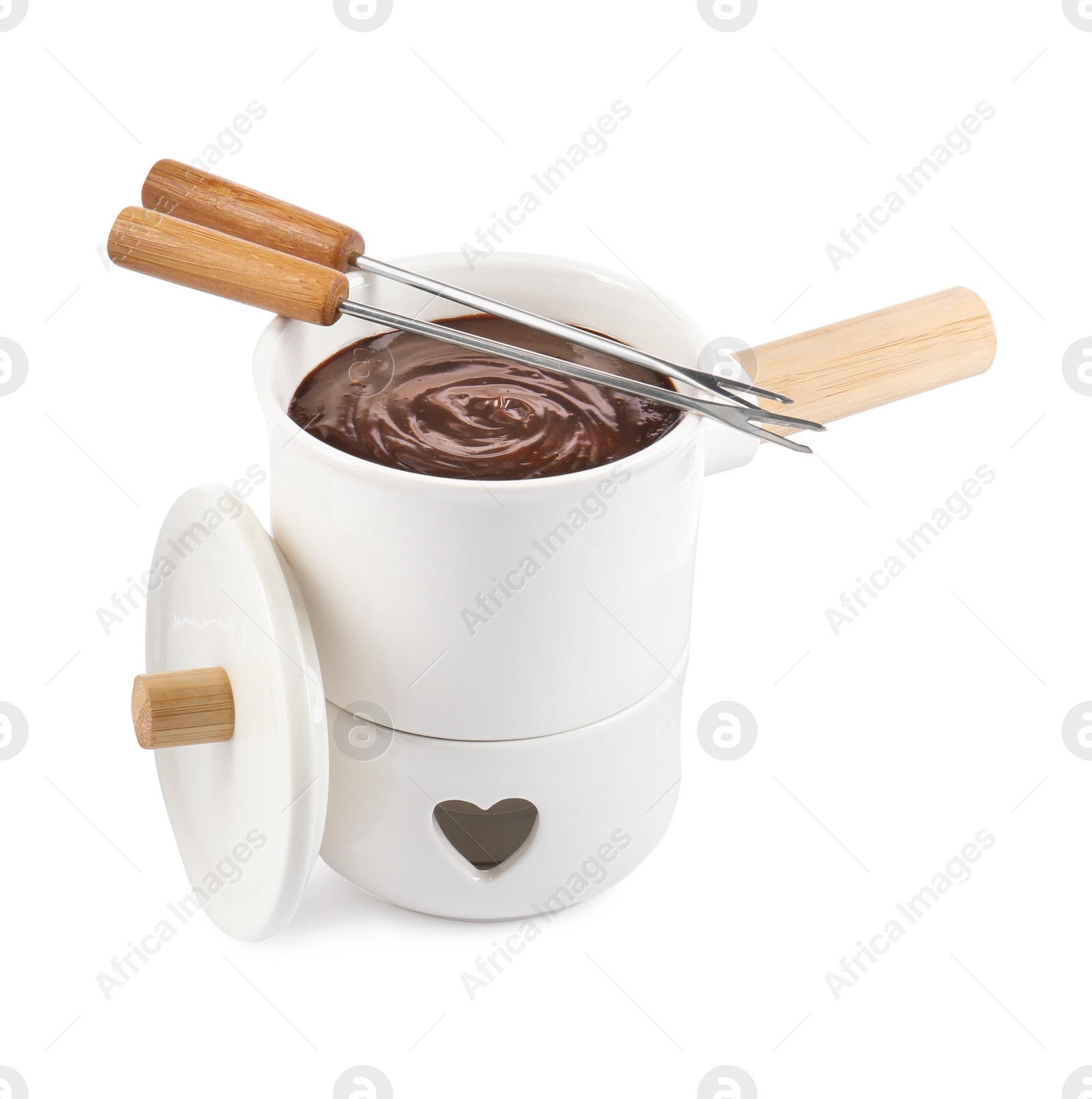 Photo of Fondue pot with melted chocolate and forks isolated on white