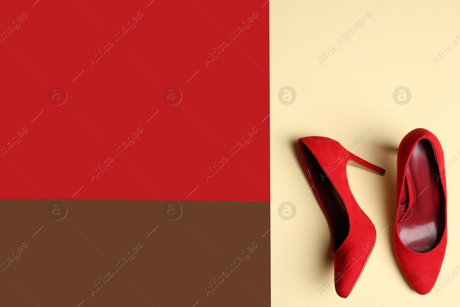 Photo of Stylish high heel shoes on color background, top view. Space for text