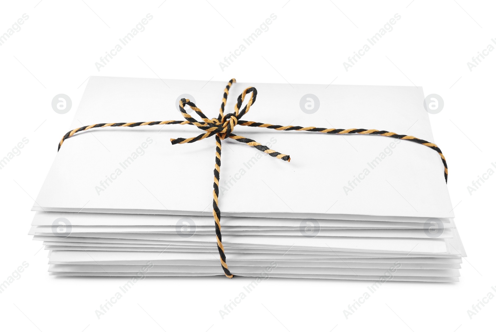 Photo of Stack of letters wrapped with rope on white background